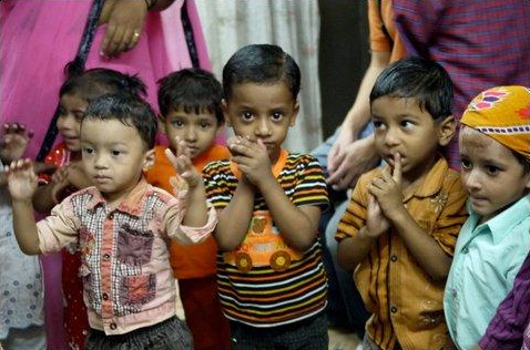 Children from Cheeta Camp learn the importance of hand-washing at a government-sponsored daycare center known as “Anganwadi.” Image by Samuel Loewenberg. India, 2011. Media file: Picture 1.png