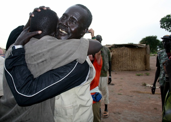 Koor meets his father for the first time in almost 20 years. Photo by Gabriel Bol Deng, H.O.P.E., gaboldeng@yahoo.com. 1