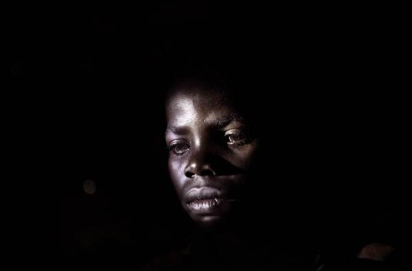 Boniface Kumbo Nyeki, 14, spent 6 months as a soldier with the LRA and was released when the Ugandan People's Defence Force (UPDF) attacked their camp. Image by Marcus Bleasdale. Democratic Republic of Congo, 2010.