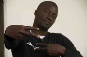 Senegalese hip-hop artist Red Black. His song, Na Dem, has become an opposition anthem in the country's presidential elections. Image by Ricci Shryock. Senegal, 2012.