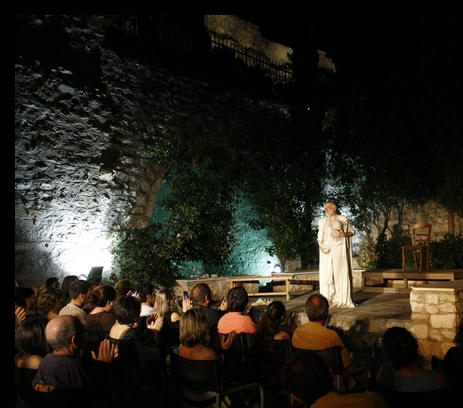 The audience takes a seat in the ancient court of Athens as Socrates goes on trial for his life. Image by Stephania Xydia. Greece, 2012 Media file: SocratesNow.jpg