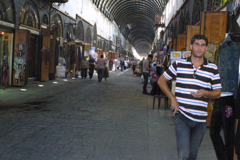 Well-connected friends of Assad remain wealthy while businessmen in the souk complain of no customers. Image by Reese Erlich. Syria, 2011. Media file: Souk is empty 2.jpg