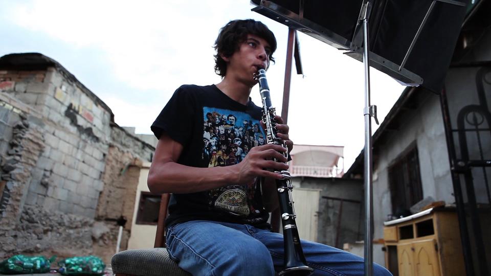 Esteban Ruiseco practices the clarinet. Image by Dominic Bracco II. Mexico, 2011. Media file: The_ClarinetistHIRES.jpg