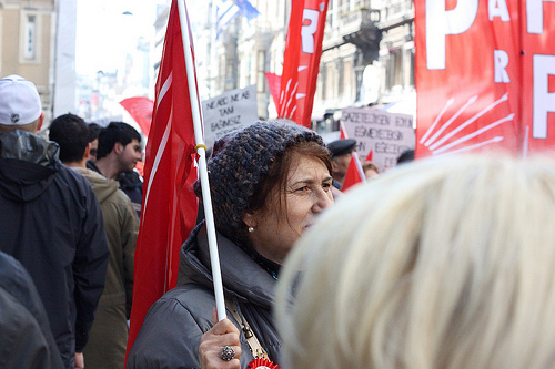 A woman protests the treatment by government towards Turkish journalists. Image by Lindsey Engh, Flickr. Turkey, 2011. Media file: TurkeyFreedomSpeech.jpg