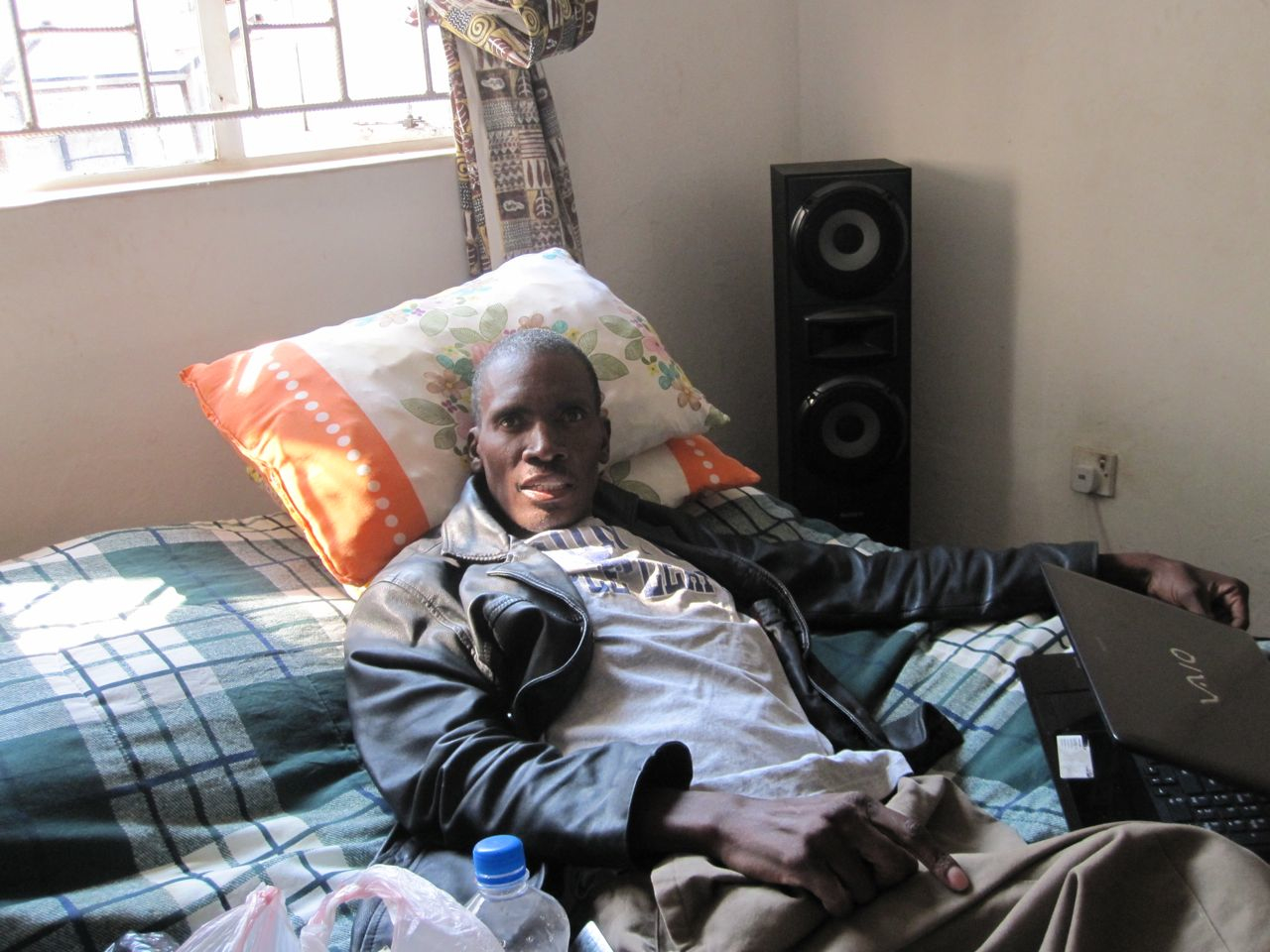 Winstone Zulu has been diagnosed with HIV enteropathy. Image by Antigone Barton. Zambia, 2011. image