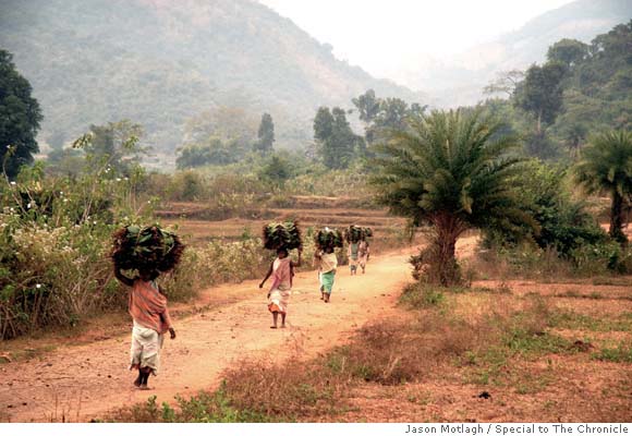 Dongria Kond women walk as far as 10 miles to take their goods to the nearest town market.