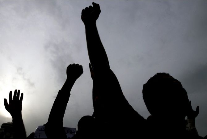 Bahraini protesters in 2011. (Joseph Eid/AFP/Getty Images) Media file: bahrain-protests-uprising-.jpg