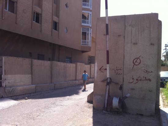 Baghdad remains a city of concrete barriers and blast walls. Image by Yochi Dreazen. Iraq, 2011. Media file: barriersiraq.jpg