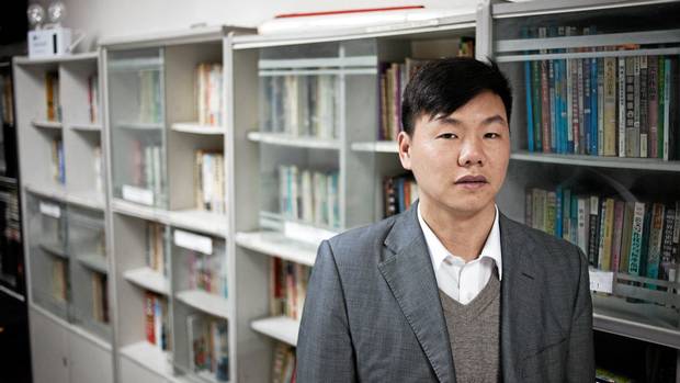 Zhang Zhiru runs Spring Labor Dispute Organization in China, which offers legal advice, a free library and a computer lab to migrant workers. Image by Jocelyn Baun. China, 2011. Zhang Zhiru runs Spring Labor Dispute Organization in China.