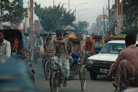 In Dhaka the best form of transportation is often a bicycle rickshaw. Image by Dan Grossman. Bangladesh, 2009. Media file: dhaka466.jpg