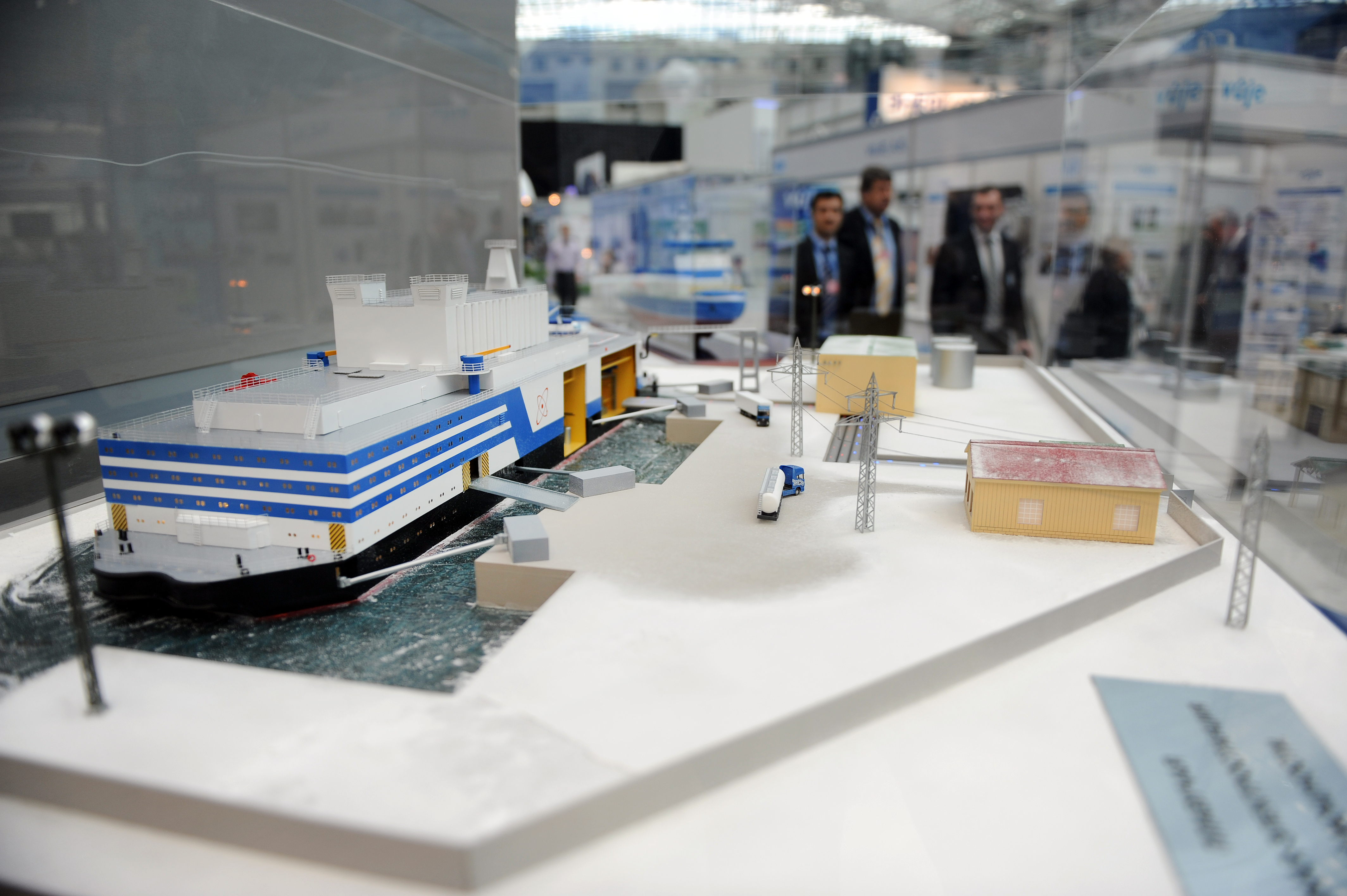 A model of Russia's floating nuclear power station on display at the Russian "ATOMEXPO" held in June in Moscow. The floating station and the "universal" icebreaker are based on similar designs and will likely run on compact, RITM-200 reactors. Photo by James Hill. Russia, 2012. Media file: floating nuke.jpg