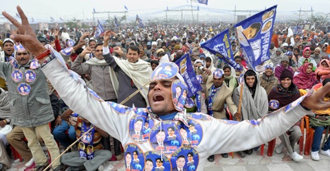 Bahujan Samaj Party supporters celebrate at a rally in Lucknow in December 2011. It was organised to woo the crucial Muslim and Thakur communities ahead of upcoming assembly election in Uttar Pradesh. Image by Ashok Dutta/Hindustan Times/ Getty Images. Media file: india.bsp_.uttar_.pradesh.ashok_.dutta_.jpg