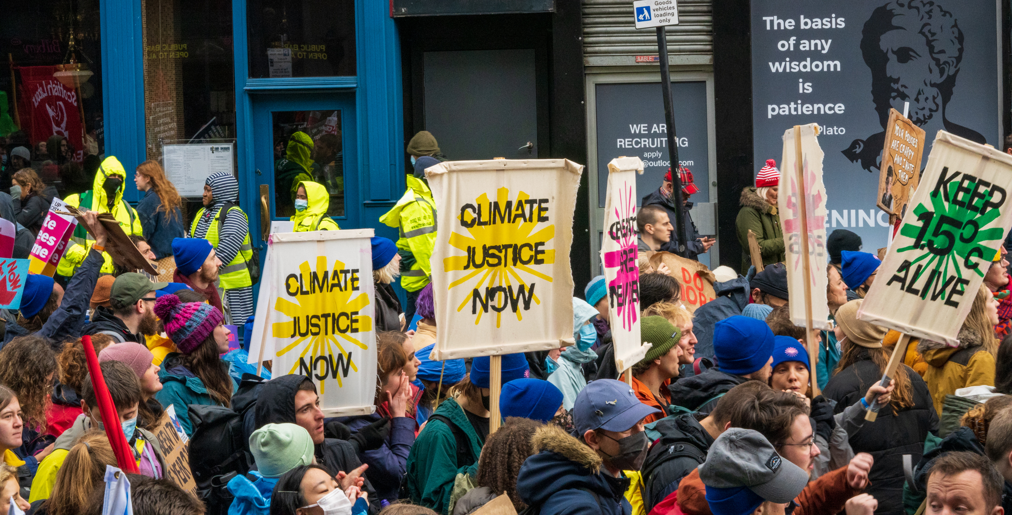climate marchers holding signs