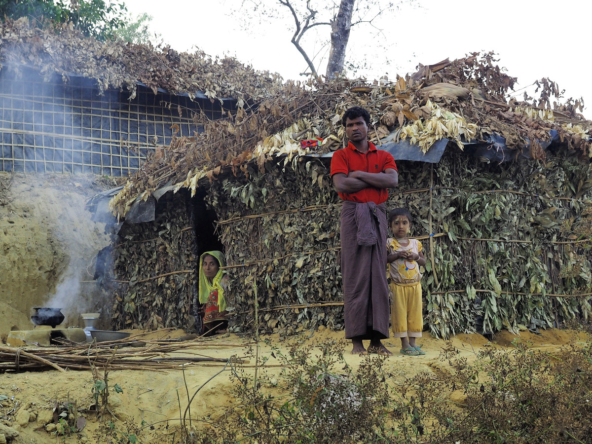 A family with their newly constructed shelter outside Balukhali Refugee Camp. Image by Doug Bock Clark. Bangladesh, 2017. A family with their newly constructed shelter outside Balukhali Refugee Camp. Image by Doug Bock Clark. Bangladesh, 2017.