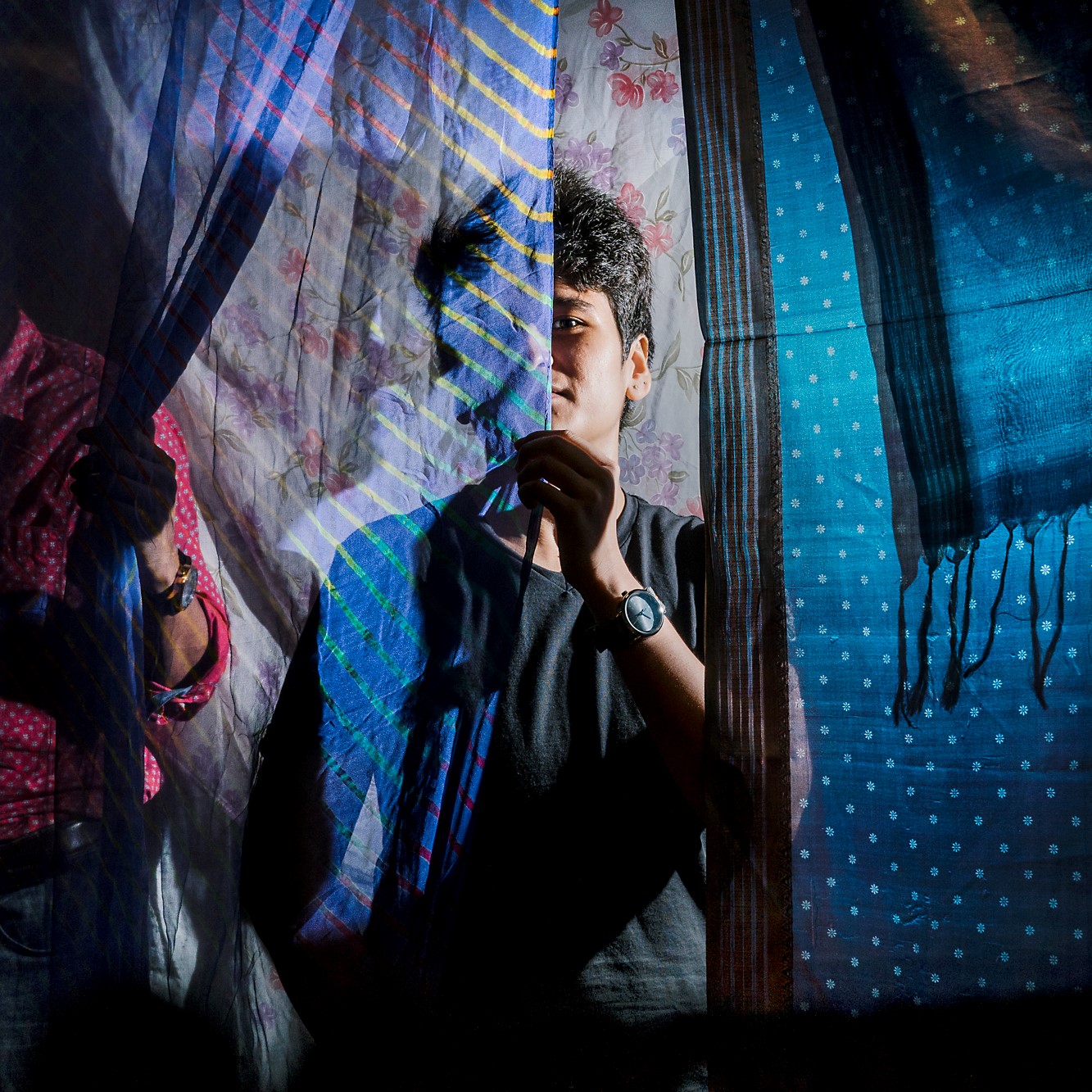 Kriti, a member of Delhi’s LGBTQ community, poses for a portrait. In many cases, Western notions of sexuality and gender don’t translate seamlessly to India, and Kriti was one for whom Western labels seemed ill-fitting. Image by Jake Naughton and Aarti Singh. India, 2017.