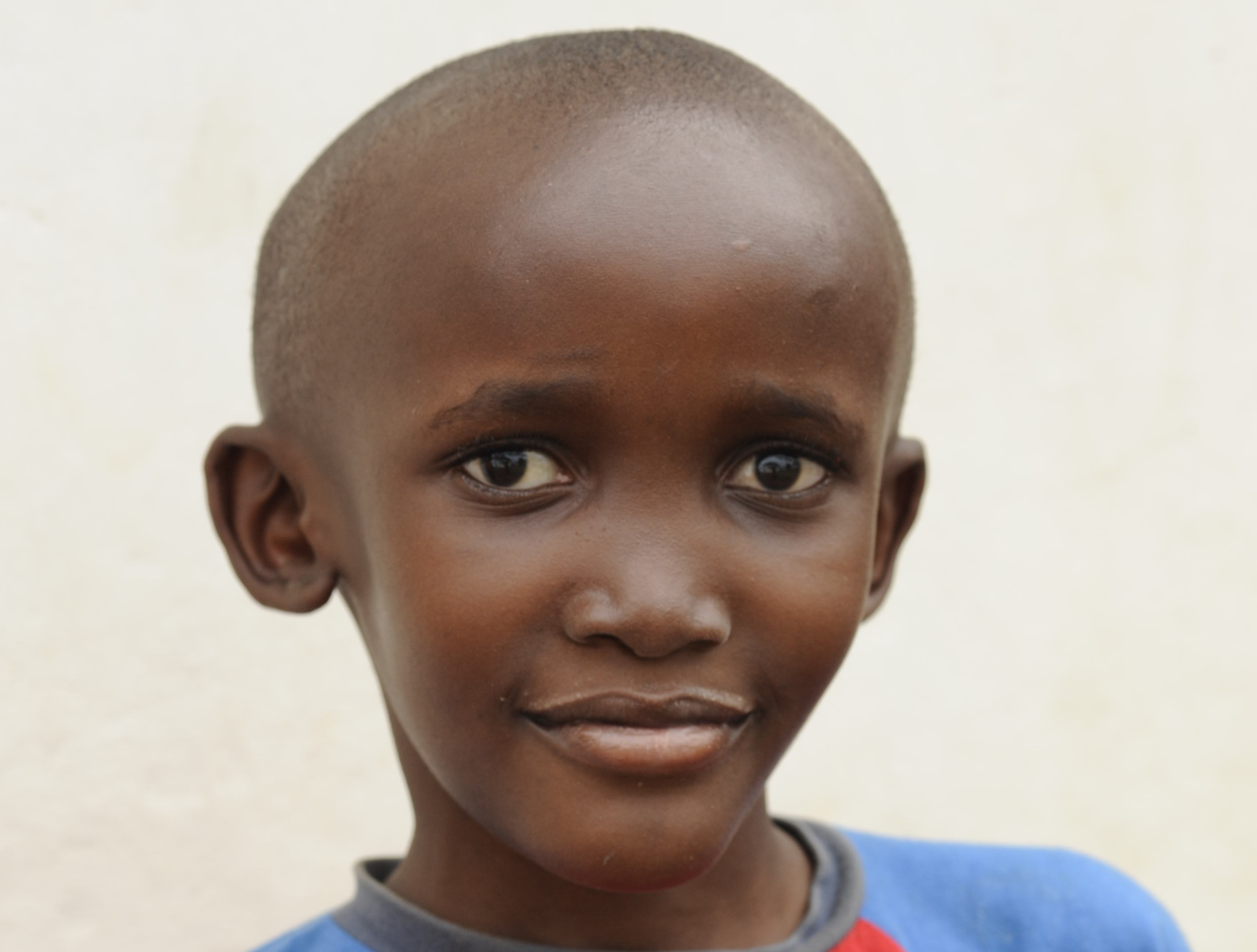 Isaac Muwunguzi, 8, is being treated for cancer at the Uganda Cancer Institute, which is partnering with the Fred Hutchinson Cancer Research Center in Seattle to improve care. Image by Jaqueline Koch/Fred Hutchinson Cancer Research Center.