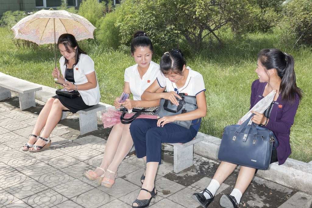 Women along a street in Pyongyang. Image by Max Pinckers/The New Yorker. North Korea, 2017. Women along a street in Pyongyang. Image by Max Pinckers/The New Yorker. North Korea, 2017.