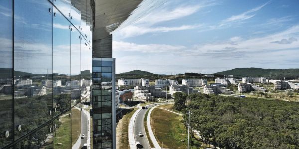 Far Eastern Federal University has a new $2-billion campus on Russky Island, near Vladivostok, a geopolitically important region close to Manchuria and the Sea of Japan. Skeptics wonder whether students and faculty will come to the windswept outpost, where winter temperatures can drop to minus 49. Image by Yuri Kozyrev. Russia, 2012. Media file: photo_26464_wide_large.jpg
