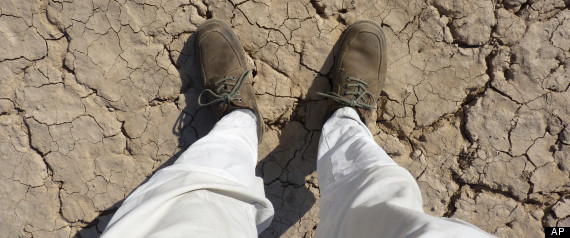 This photo taken Tuesday, Oct. 23, 2012 and released by the National Geographic Society on Thursday, Jan. 10, 2013, shows Paul Salopek standing on the desert flats in Djibouti. (AP Photo/National Geographic, Paul Salopek) Media file: r-PAUL-SALOPEK-WALK-large570.jpg