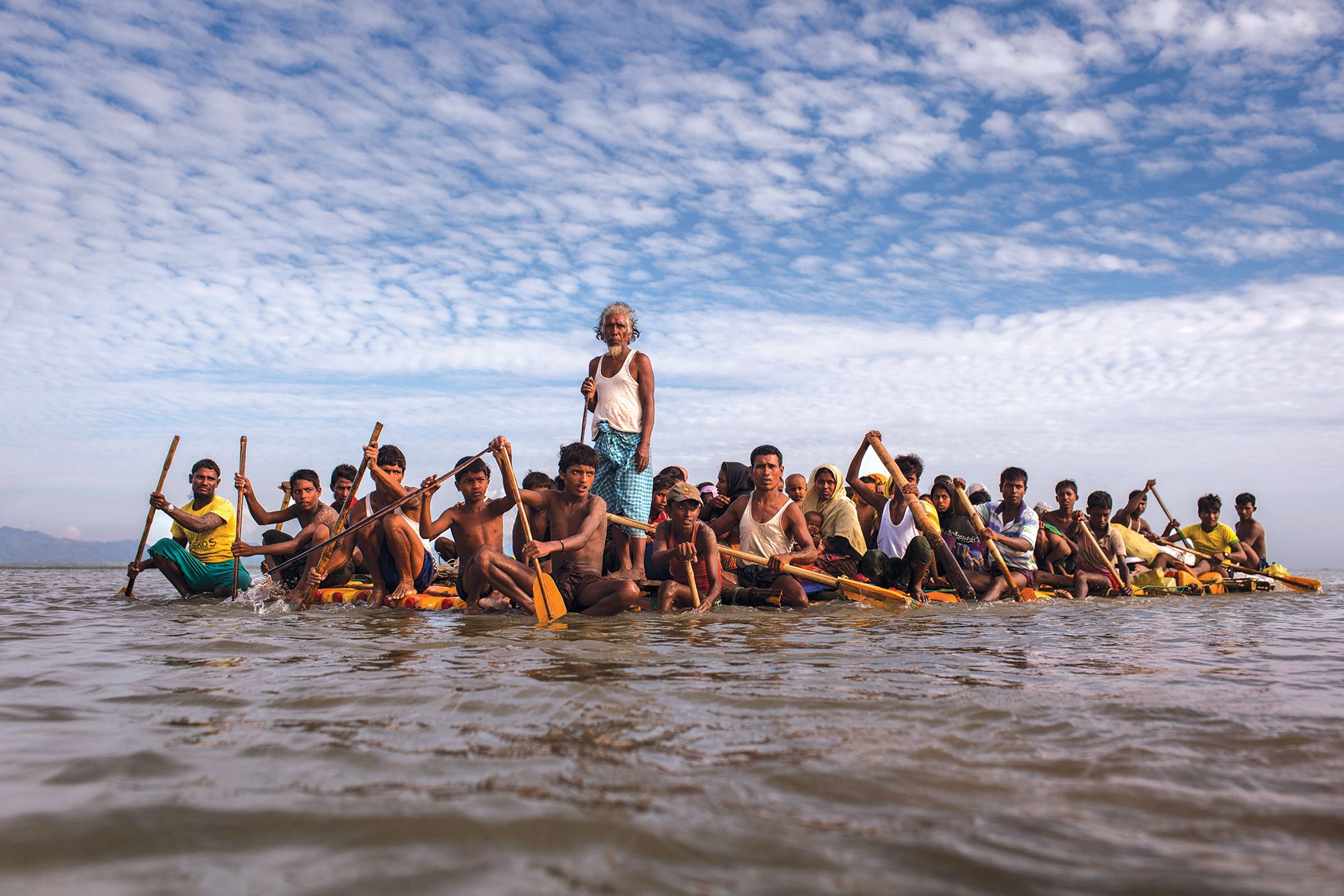 Rohingya fleeing across the Naf River to Bangladesh. The crisis made global headlines in 2015 when boats packed with starving Rohingya were stranded at sea. For weeks, no country would accept them. Image by Patrick Brown/Panos Pictures/UNICEF. Bandladesh, 2017. Rohingya fleeing across the Naf River to Bangladesh. The crisis made global headlines in 2015 when boats packed with starving Rohingya were stranded at sea. For weeks, no country would accept them. Image by Patrick Brown/Panos Pictures/UNICEF. Bandladesh, 2017.