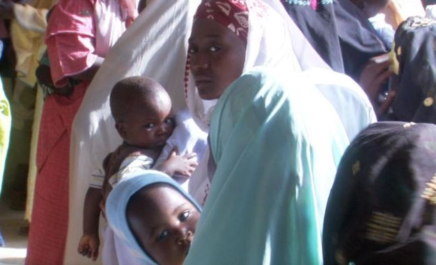 As Nigeria works to “re-brand” itself from a post-colonial military state to a progressive African democracy, leaders have recognized that one of the most pressing problems for this emerging society is also its most treatable: maternal and infant mortality. Image by Dawn Sinclair Shapiro. Nigeria, 2010. image