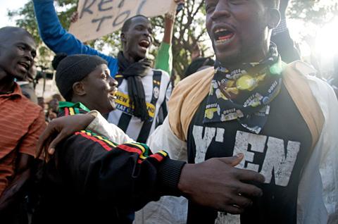 Protesters in Senegal demand that President Abdoulaye Wade quit his bid for a third term in February 26 elections. Image by Ricci Shryock. Senegal, 2012.