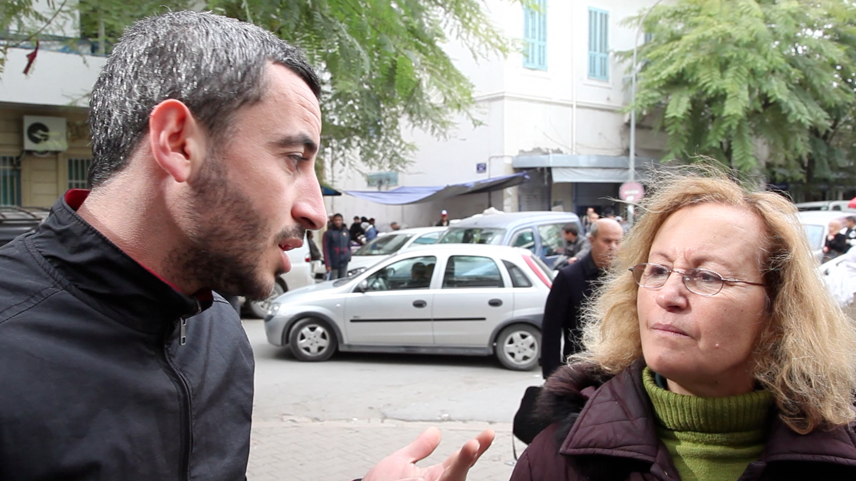Tunisians are eager to debate whether the Ennahda, the ruling centrist Islamic Party, has succeeded in fulfilling the promise of the revolution last year. Image by Jessie Deeter. Tunisia, 2012.