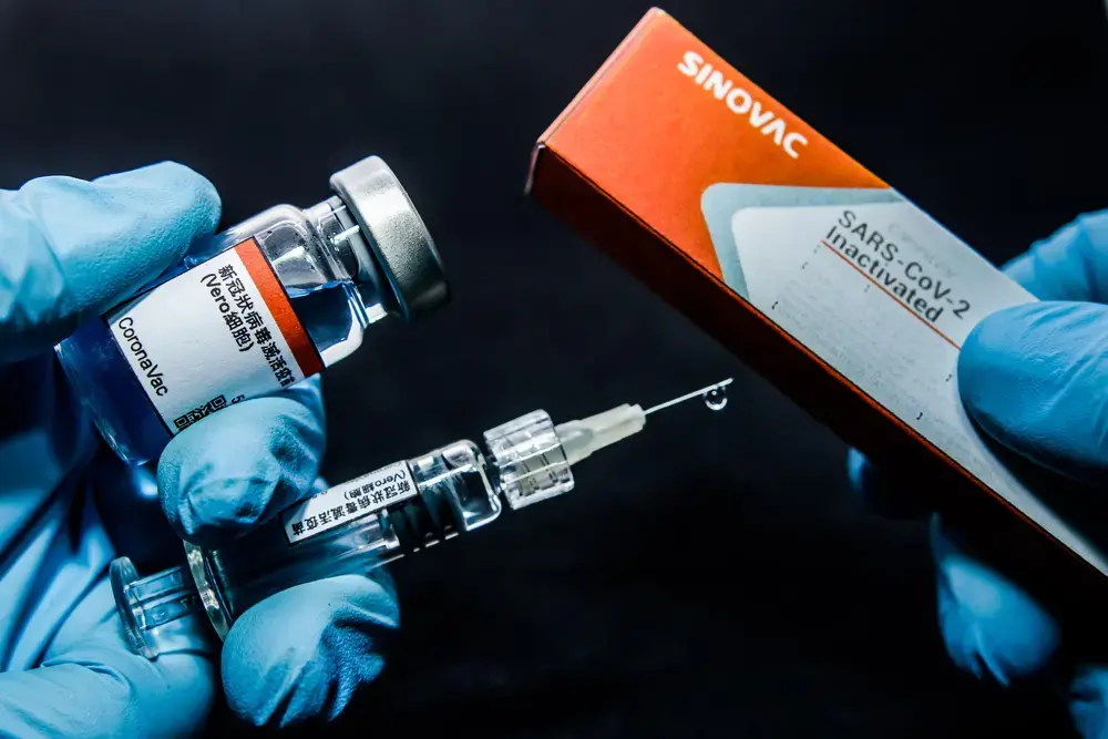 Conceptual bottle of the Chinese/Brazilian vaccine against COVID-19, CoronaVac. Image by cadu.rolim / Shutterstock. Brazil, 2020.