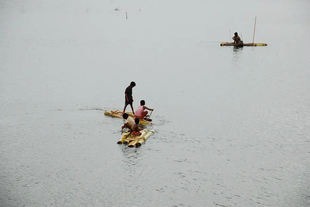 Children play with old rafts over flooded fields in rural Bangladesh. Image by Amir Jina / CC. Bangladesh, 2009. Children play with old rafts over flooded fields in rural Bangladesh. Image by Amir Jina / CC. Bangladesh, 2009.