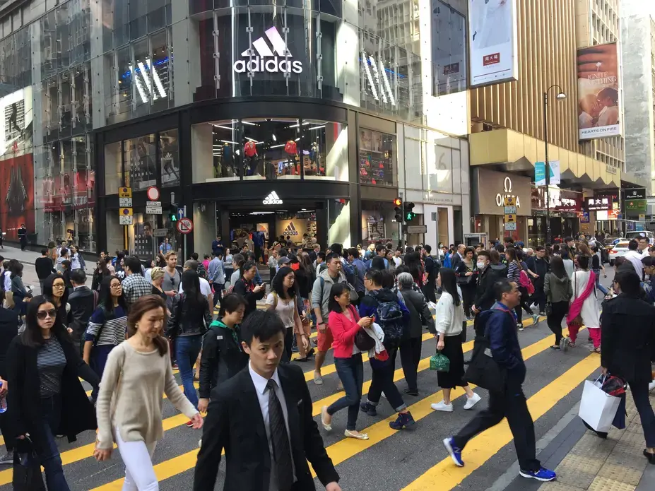 A workday street scene from the "Central" neighborhood, in Hong Kong, which was the scene of unprecedented anti-government protests in 2014. Image by Howard W. French. China, 2017. A workday street scene from the "Central" neighborhood, in Hong Kong, which was the scene of unprecedented anti-government protests in 2014. Image by Howard W. French. China, 2017.