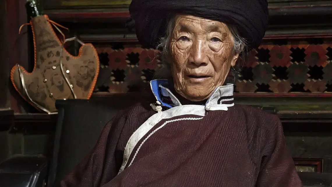 Mosuo woman. Image by Jason Motlagh. China, 2017. Mosuo woman. Image by Jason Motlagh. China, 2017.