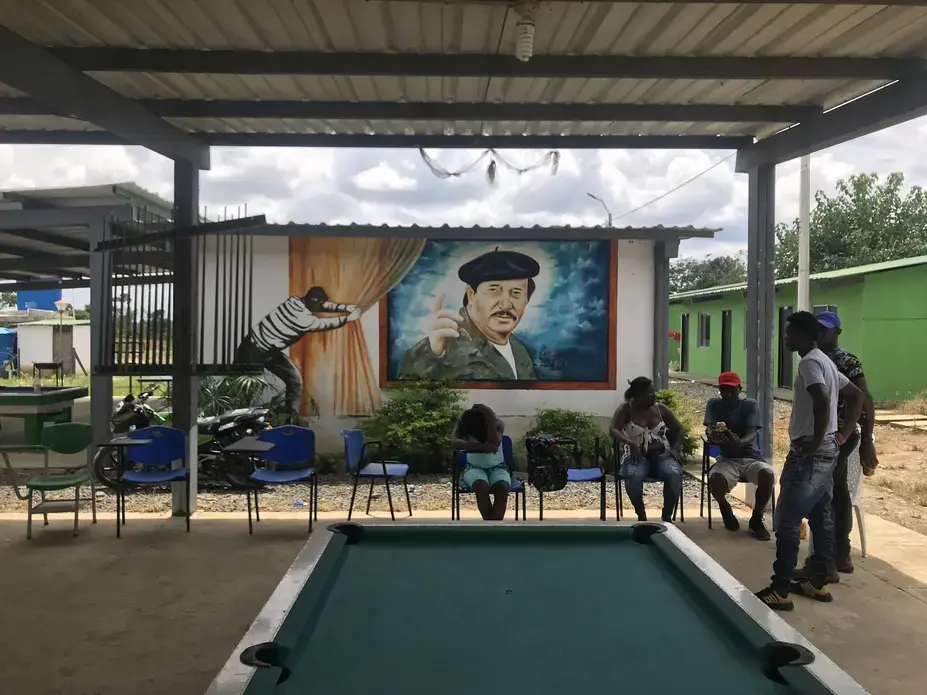 Former FARC members living in transition zones have painted their homes and public areas with colourful murals of the group's leaders, like this one in Tumaco. Image by Mariana Palau/TNH. Colombia, 2019.