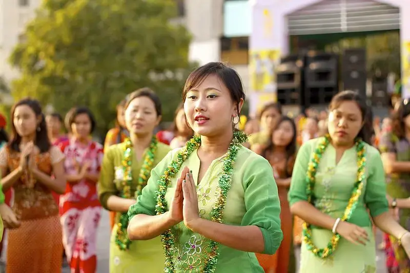 Burmese women perform traditional dance during closing ceremony of Myanmar New Year Water Festival 2011 in Yangon, Myanmar. Image by Htoo Tay Zar. Myanmar, 2011. Burmese women perform traditional dance during closing ceremony of Myanmar New Year Water Festival 2011 in Yangon, Myanmar. Image by Htoo Tay Zar. Myanmar, 2011.