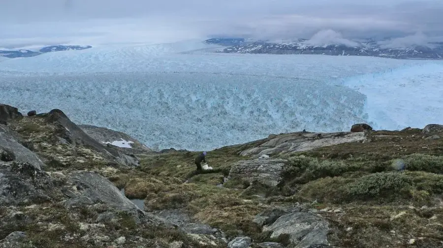 The three mile-wide Helheim glacier is one of the biggest outlets of the massive Greenland ice cap, the second-largest in the world. Image by Ari Daniel. Greenland, 2016. Media file: arctic.jpg