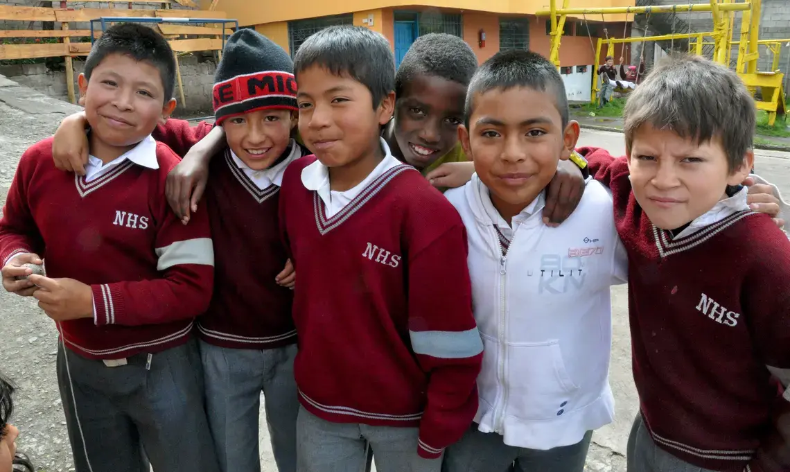 Students at La Escuela Nuevos Horizontes del Sur enjoy recess before heading back inside to their classroom. Image by Kate Riley. Ecuador, 2014. Media file: dsc_0138.jpg