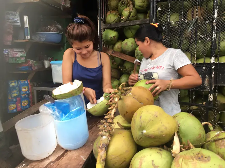 A coconut stand in Manila. The online gambling business is booming in the Philippines, but its many critics complain that rising rents and social problems caused by it are harming ordinary Filipinos. Image by Richard Bernstein. Philippines, 2020. A coconut stand in Manila. The online gambling business is booming in the Philippines, but its many critics complain that rising rents and social problems caused by it are harming ordinary Filipinos. Image by Richard Bernstein. Philippines, 2020.