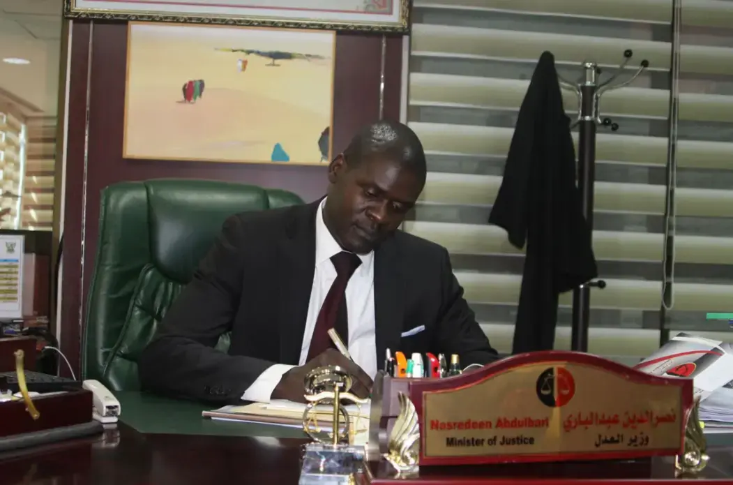 Sudanese Minister of Justice Nasredeen Abdulbari at work. Image by Rebecca Hamilton. Sudan, 2019. Sudanese Minister of Justice Nasredeen Abdulbari at work. Image by Rebecca Hamilton. Sudan, 2019.