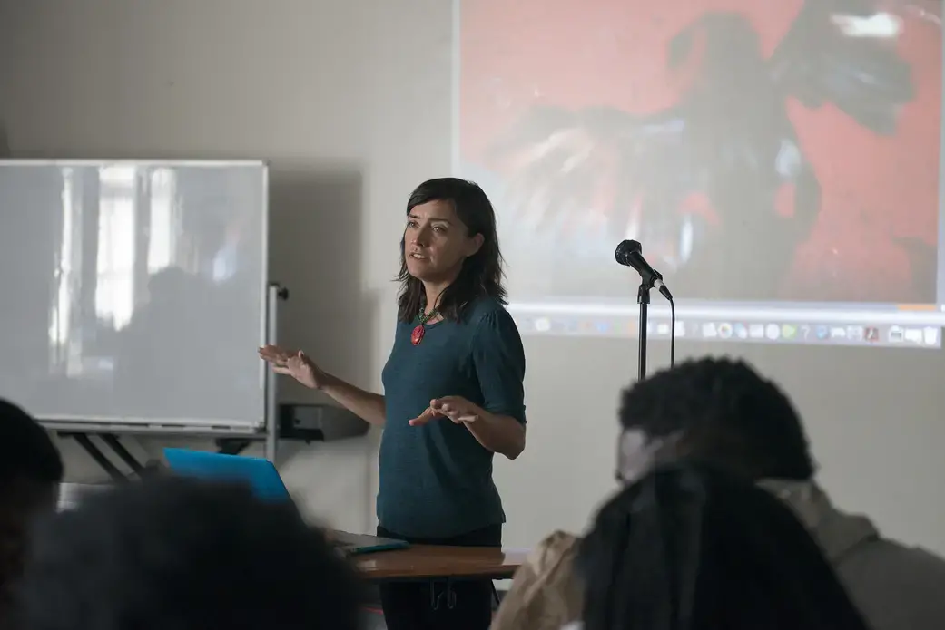 Pulitzer Center grantee Allison Shelley speaks to Soul of the City students at Richard Wright Public Charter School about photojournalism and her work in Haiti. Image by Jordan Roth. United States, 2016. Pulitzer Center grantee Allison Shelley speaks to Soul of the City students at Richard Wright Public Charter School about photojournalism and her work in Haiti. Image by Jordan Roth. United States, 2016.