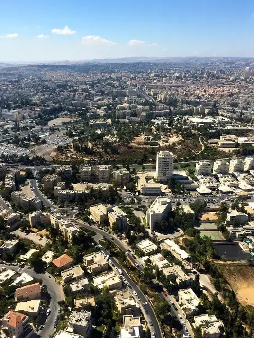 Birds eye view of homes and businesses in Israel. Image by Miriam Berger. Israel, 2014.