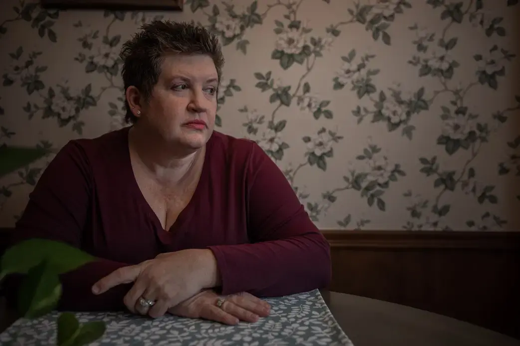 Amy Slagle sits in her kitchen in south Tulsa in Oklahoma. Her daughter Clorinda Archuleta is serving three concurrent life sentences for permitting child abuse and child neglect. Slagle believes her daughter's sentence was excessive. Media file: amy_schlagle_portraits-1.jpg
