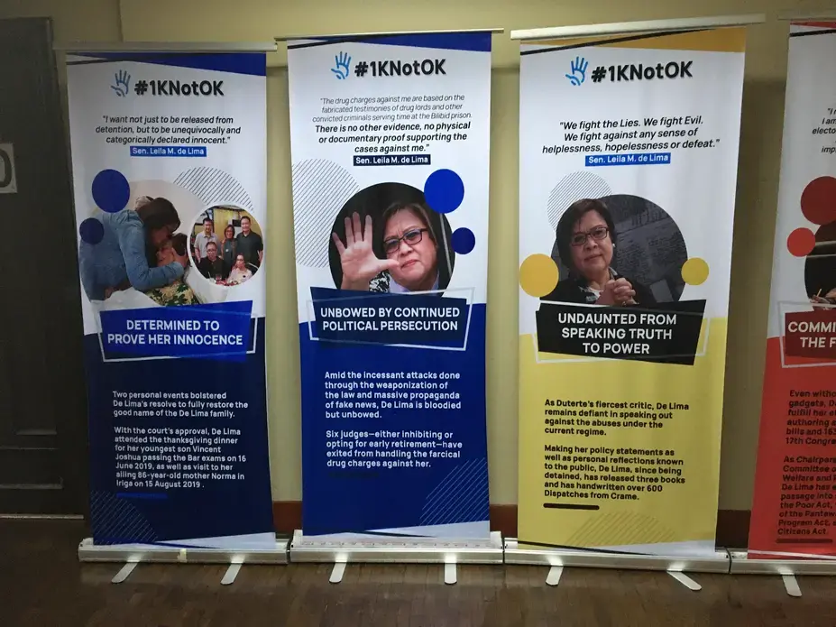 Posters of opposition politician Leila de Lima outside her office in the Philippine Senate. De Lima, a sharp critic of Filipino president Rodrigo Duterte, has been in prison for more than three years on what legal experts, human rights organizations, and fellow opposition politicians believe to be trumped up charges of drug trafficking. Image by Richard Bernstein. Philippines, 2019. Posters of opposition politician Leila de Lima outside her office in the Philippine Senate. De Lima, a sharp critic of Filipino president Rodrigo Duterte, has been in prison for more than three years on what legal experts, human rights organizations, and fellow opposition politicians believe to be trumped up charges of drug trafficking. Image by Richard Bernstein. Philippines, 2019.