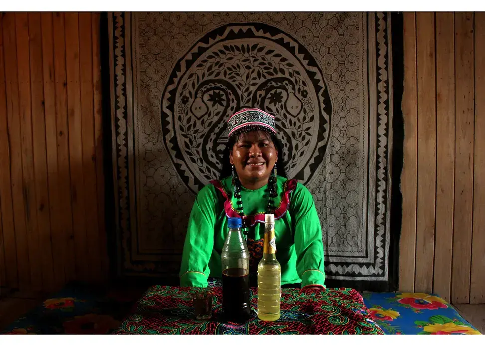 Karina Garcia Rios, the only female shaman in her community 15 hours from the nearest city of Pucallpa says harvesting female power is what makes her an effective doctor. Image by Natalie Hutchison. Peru, 2017.