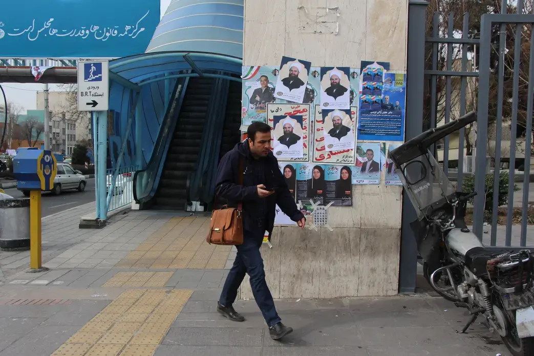 Many Tehran residents ignored the campaign posters and stayed away from the polls. Only 25 percent of Tehran residents voted. Image by Reese Erlich. Iran, 2020. Many Tehran residents ignored the campaign posters and stayed away from the polls. Only 25 percent of Tehran residents voted. Image by Reese Erlich. Iran, 2020.