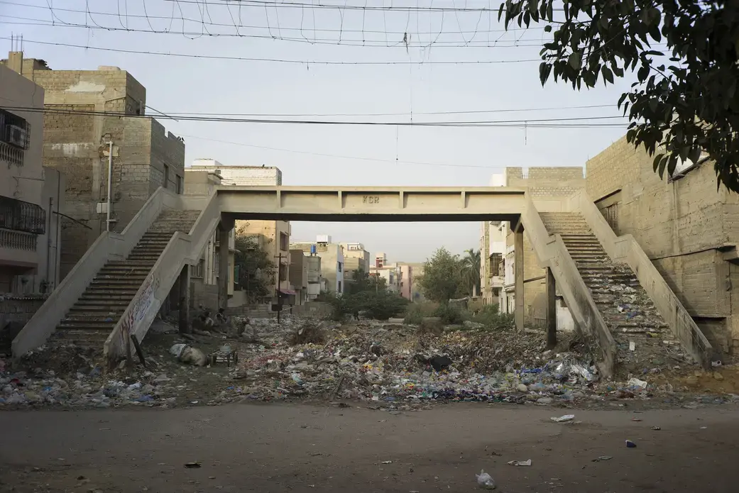 Informal Housing, Footbridge near Orangi Town Station, Karachi, Pakistan. Image from KCR, by Ivan Sigal. Pakistan, 2014-2017.
