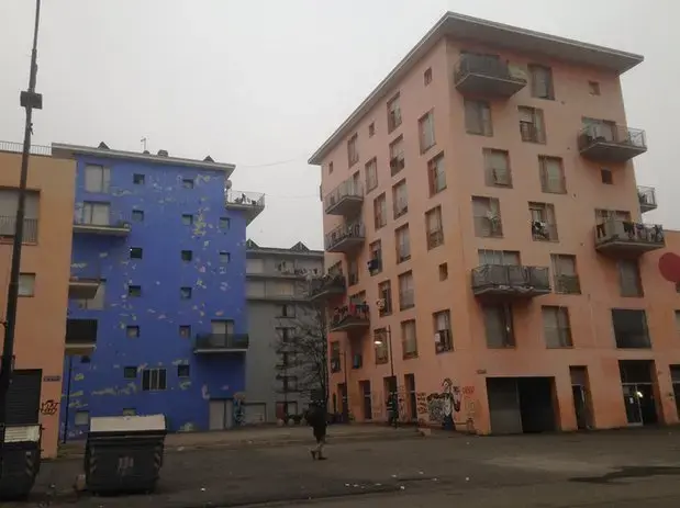 Abandoned athletes’ accommodation now occupied by migrants. Image by Claire Provost. Italy, 2016. Turin's Occupied Olympic Village
