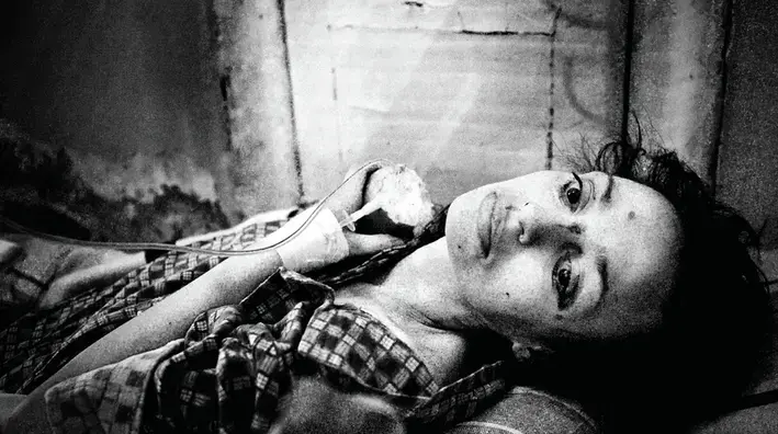 A woman inside the Botkin Infectious Disease Hospital in St. Petersburg, Russia. Image by Misha Friedman. Russia, 2013. Media file: polina.png
