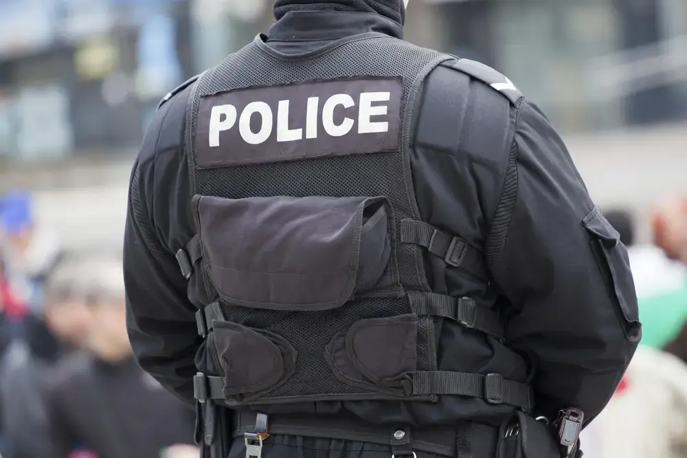 Detail of a police officer. Image by Shutterstock. United States, undated. Detail of a police officer. Image by Shutterstock. United States, undated.
