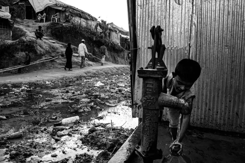 The sheer number of people and the limited infrastructure have led to filthy conditions in the camps. There is almost no privacy. Image by Szymon Barylski. Bangladesh, 2018.
