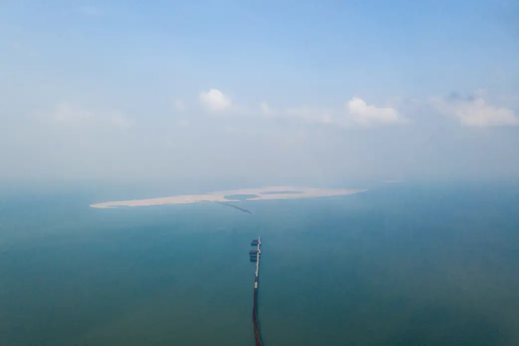 Ruyi island, off Haikou city, was intended as a tourist destination, with theme parks and hotels. Its planned size is over 7 square kilometres and it is to be linked to the mainland through a 5.6 km bridge. In an inspection by the authorities in 2017, the project was found to have reclaimed 210,000 sqm of the sea without proper permits. The land reclamation there which started in 2015 has been stopped because of both the environmental inspection as well as the developer running short of funds. In July 2018…