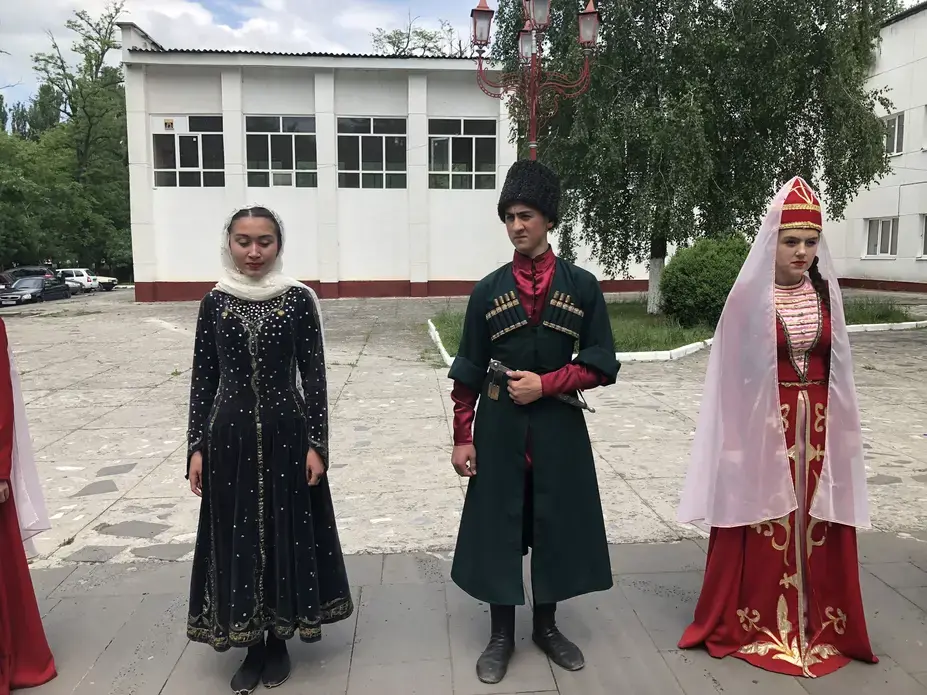 Young Circassians in formal dress in Terek. Image by Ben Mauk. Russia, 2019. 
